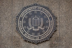 WASHINGTON, DC - DECEMBER 26: F.B.I. seal located outside the J. Edgar Hoover F.B.I. Building in downtown Washington, DC on December 26, 2014.