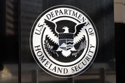 WASHINGTON, DC - FEBRUARY 15: Department of Homeland Security Seal located outside the US Immigration and Customs Enforcement Headquarters in Washington, DC on February 15, 2015.