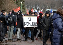 SAINT-PETERSBURG, RUSSIA, MARCH 1, 2015 - Procession in memory of Boris Nemtsov in St. Petersburg on March 1st 2015. A man with a poster: I am Nemtsov