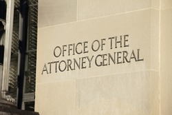 WASHINGTON, DC - DECEMBER 26: Sign outside the Office of the Attorney General located in the Department of Justice Building in downtown Washington, DC on December 26, 2014.