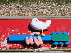 The guitar and dove became the symbol of the Woodstock Music Festival. This plaque is on the marker that sits on the original site.