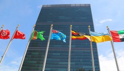 NEW YORK CITY - APRIL 30, 2015: International Flags in the front of United Nations Headquarter in New York