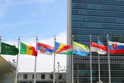 NEW YORK CITY - APRIL 30, 2015: International Flags in the front of United Nations Headquarter in New York