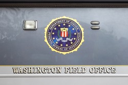 WASHINGTON, DC - JUNE 5: FBI seal on a Mobile Command Center parked in front of the Federal Bureau of Investigation Washington Field Office in Washington, DC on June 5, 2015.
