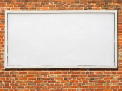 Large billboard with blank white paper ready for text.