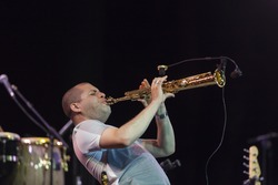 GRANADA, SPAIN - JULY 23, 2015: Marcus Miller and his band, Afrodeezia tour, at 28 International Jazz Festival of Almunecar, Spain. Alex Hans, saxophone.
