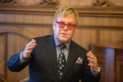 KIEV, UKRAINE - Sep 12, 2015: World-famous musician, composer and singer Elton John well-known in world for his charitable activity in fight against AIDS against his meeting with President of Ukraine