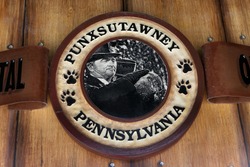 PUNXSUTAWNEY, PA - MARCH 29: Sign at Phils Burrow in downtown Punxsutawney, PA on March 29, 2015. The sign depicts a scene with Bill Murray from the popular movie Groundhog Day.