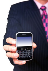 Man holding a mobile phone organizer towards camera, screen has a clipping path to add your own message or image. The device has been significantly altered from the original product.