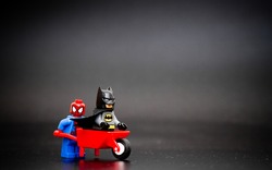 Orvieto, Italy - April 13th 2016: Batman an Spiderman Lego minifigure.. Lego is a popular line of construction toys manufactured by the Lego Group.