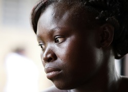 BURKINA FASO - AUGUST 12: Women of the association of women in Gaoua, perform outstanding work in literacy, disclosure of the risk of genital mutilation, August 12, 2009 in Gaoua, Burkina Faso