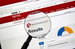 MONTREAL, CANADA - JUNE 24, 2016 : Brexit results on BBC news site under magnifying glass. The Brexit, an abbreviation of 'British exit' refers to the possibility of Britain's withdrawal from the EU