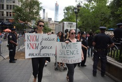 NEW YORK CITY - JULY 9 2016: Several hundred activists gathered for a rally & march in Times Square to protest alleged police brutality in the deaths of several African-American men.