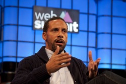 DUBLIN, IRELAND - NOVEMBER 2015: Former England and Manchester United football player, Rio Ferdinand, speaks at the Web Summit in the Royal Dublin Society.