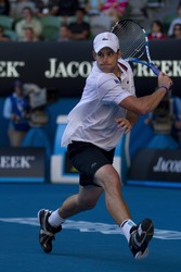 MELBOURNE, AUSTRALIA - JANUARY 26: Andy Roddick in action against Marin Cilic's (Croatia) quarter finals game during the 2010 Australian Open on January 26, 2010 in Melbourne, Australia