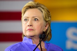 CINCINNATI, OHIO, USA - JUNE 27, 2016: Hillary Clinton with a pensive expression speaks at a campaign event at the Museum Center during a joint appearance with Senator Elizabeth Warren.