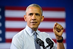 CHARLOTTE, NC, USA - JULY 5, 2016: President Barack Obama with the US flag in the background delivers a speech at a campaign rally for the Hillary Clinton at the Charlotte Convention Center.