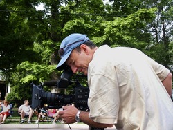 Cameraman getting video of Twins Days parade, Twinsburg OH