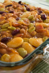 Baked bean casserole with butter beans, lima beans, kidney beans, white navy beans, and bacon.