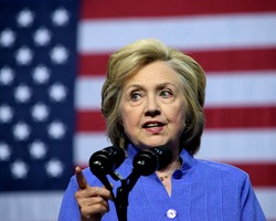 SCRANTON, PA, USA - AUGUST 15, 2016: Democratic presidential nominee Hillary Clinton speaks with the American Flag in the background at a campaign rally at Riverfront Sports.