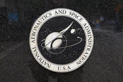 WASHINGTON, DC - JULY 17: Weathered logo at National Aeronautics and Space Administration Headquarters in Washington, DC on July 17, 2015.