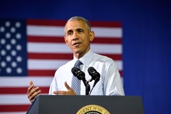 CHARLOTTE, NC, USA - JULY 5, 2016: President Barack Obama gestures at a campaign rally for the presumptive democratic nominee at the Charlotte Convention Center.