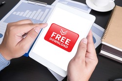 Free Download Modern people doing business, graphs and charts being demonstrated on the screen of a touch-pad,blank screen copy space