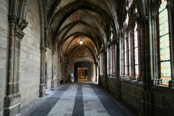 Gothic interior - corridor in cathedral in Burgos, Castile, Spain. Old Catholic landmark listed on UNESCO World Heritage List.