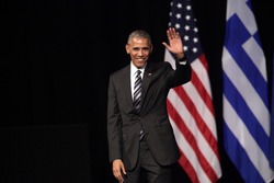Athens, Greece, Nov 16, 2016:U.S. President Barack Obama waves to the crowd as he delivers a speech at the new opera of Athens on Wednesday