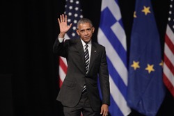 Athens, Greece, Nov 16, 2016:U.S. President Barack Obama waves to the crowd as he delivers a speech at the new opera of Athens on Wednesday
