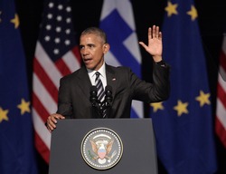 Athens, Greece, Nov 16, 2016:U.S. President Barack Obama waves to the crowd as he delivers a speech at the new opera of Athens on Wednesday