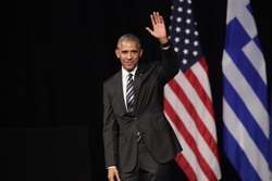 Athens, Greece, Nov 16, 2016:U.S. President Barack Obama waves to the crowd as he delivers a speech at the new opera of Athens on Wednesday