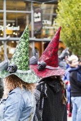 VICTORIA CANADA OCT 31 16: Crowded downtown with happy joyful people wearing Halloween, creative costumes,makeups on Wicked Victoria Day. The city has a torrid history that come to life at Halloween.