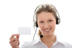 Call center woman with headset showing business card. Beautiful smiling caucasian woman isolated on white background.
