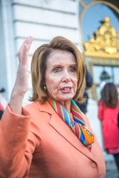SAN FRANCISCO CA/UNITED STATES - JANUARY 15 2017: Nancy Pelosi, congresswoman of 12th congressional district of San Francisco talks to constituents after a Healthcare Rally in front of city hall.