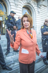 SAN FRANCISCO CA/UNITED STATES - JANUARY 15 2017: Nancy Pelosi, congresswoman of 12th congressional district of San Francisco talks to constituents after a Healthcare Rally in front of city hall.