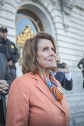 SAN FRANCISCO - JANUARY 15 2017: Nancy Pelosi, Democratic minority leader of the House of Representatives speaks to constituents after Healthcare rally at San Francisco city hall.