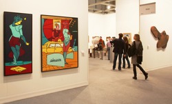 MILAN - MARCH 27: People walk through work of arts galleries during MiArt ArtNow, international exhibition of modern and contemporary art March 27, 2010 in Milan, Italy.