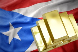gold reserves. shining golden bullions on the puerto rico flag background