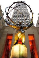 NEW YORK CITY - MAY 14: The historic Atlas Statue in Rockefeller Center stands in front o f the GE Building May 14, 2010 in New York City.