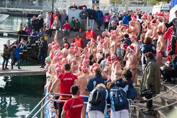 BARCELONA, SPAIN - DECEMBER 25, 2016: Copa de Nadal de Natació traditional open water swim at Christmas day. Barcelona, Spain