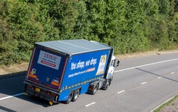 HATFIELD, UK - SEPTEMBER 2016: Lorry belongs to Tesco in motion on the British road