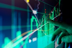 A city worker Analysing illustrated stock market financial data on a screen.