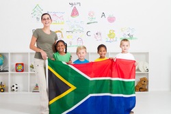 south african kindergarten teahcer and students with south africa flag