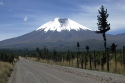 Dirt road that leads to the majestic Cotopaxi (the highest active volcano in the world), in the heart of the Andes, Ecuador, South America.