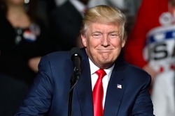 HERSHEY, PA - DECEMBER 15, 2016: President Trump "Cheshire cat" smile during his speech at a "Thank You" Tour rally held at the Giant Center.