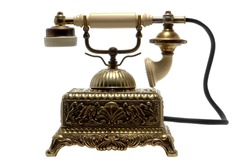 Ornate antique brass old fashioned cradle type vintage telephone isolated on white