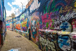 GENT, BELGIUM - JUNE 14, 2016: Graffiti street in Gent in a beautiful summer day, Belgium on June 14, 2016
