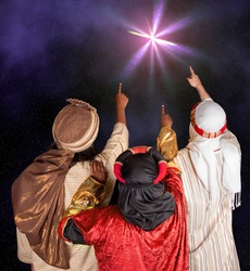 Wisemen Caspar Melchior and Balthasar following the star of Bethlehem
