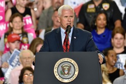 HARRISBURG, PA - APRIL 29, 2017: Vice President Mike Pence speaking at a Trump campaign rally marking 100 days in office at The Farm Show Complex and Expo Center.